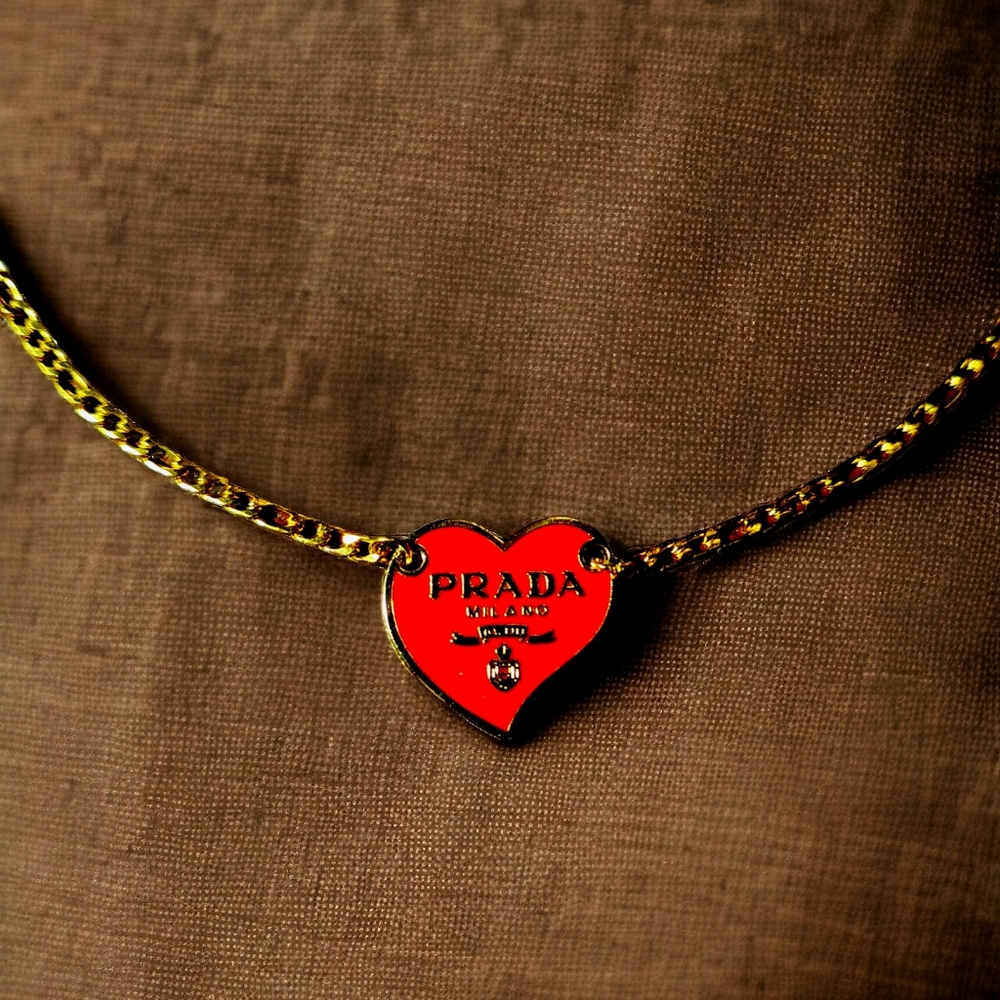 Red & gold heart on a gold plated steel necklace